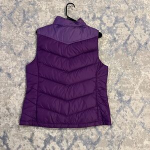 Purple north face vest,size medium